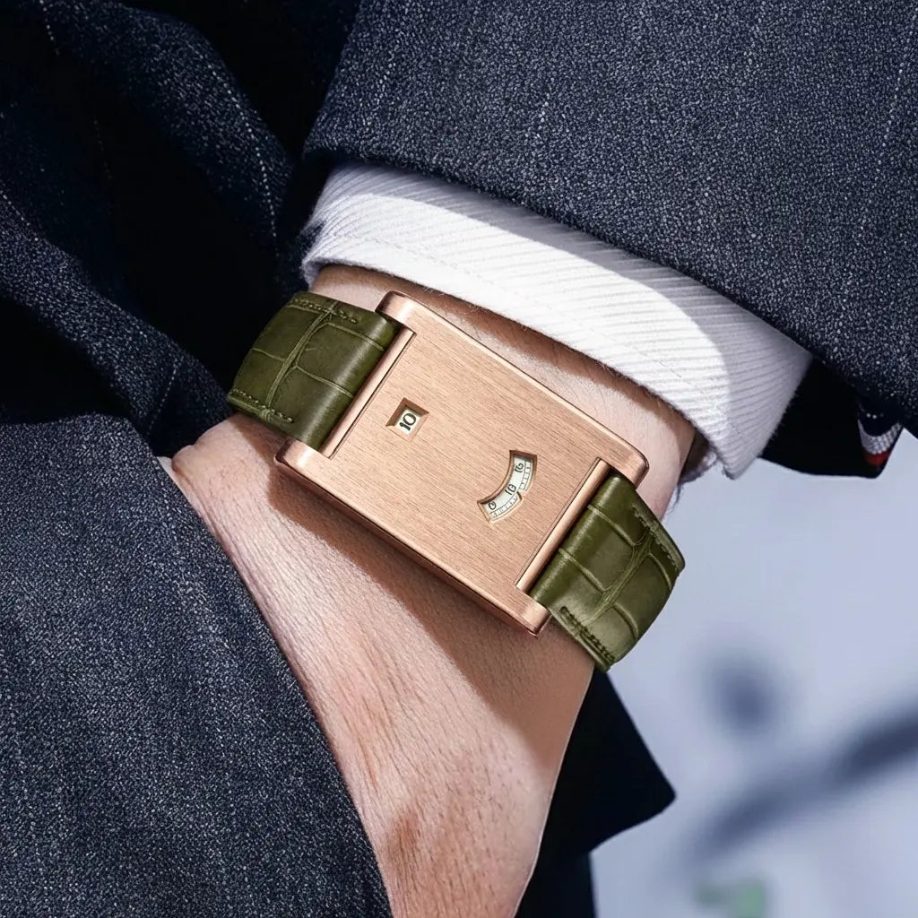 Rose gold watch with green strap on a person&